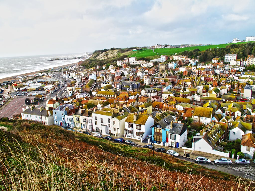 Charming coastal town with colorful houses and sea view from a high vantage point.
